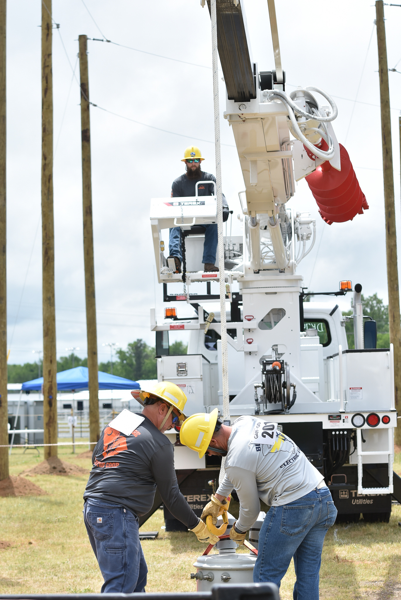 Blue Ridge Electric Cooperative compete during the Equipment Operator’s Rodeo competition at the 2022 Gaff-n-Go Lineworker’s Rodeo.