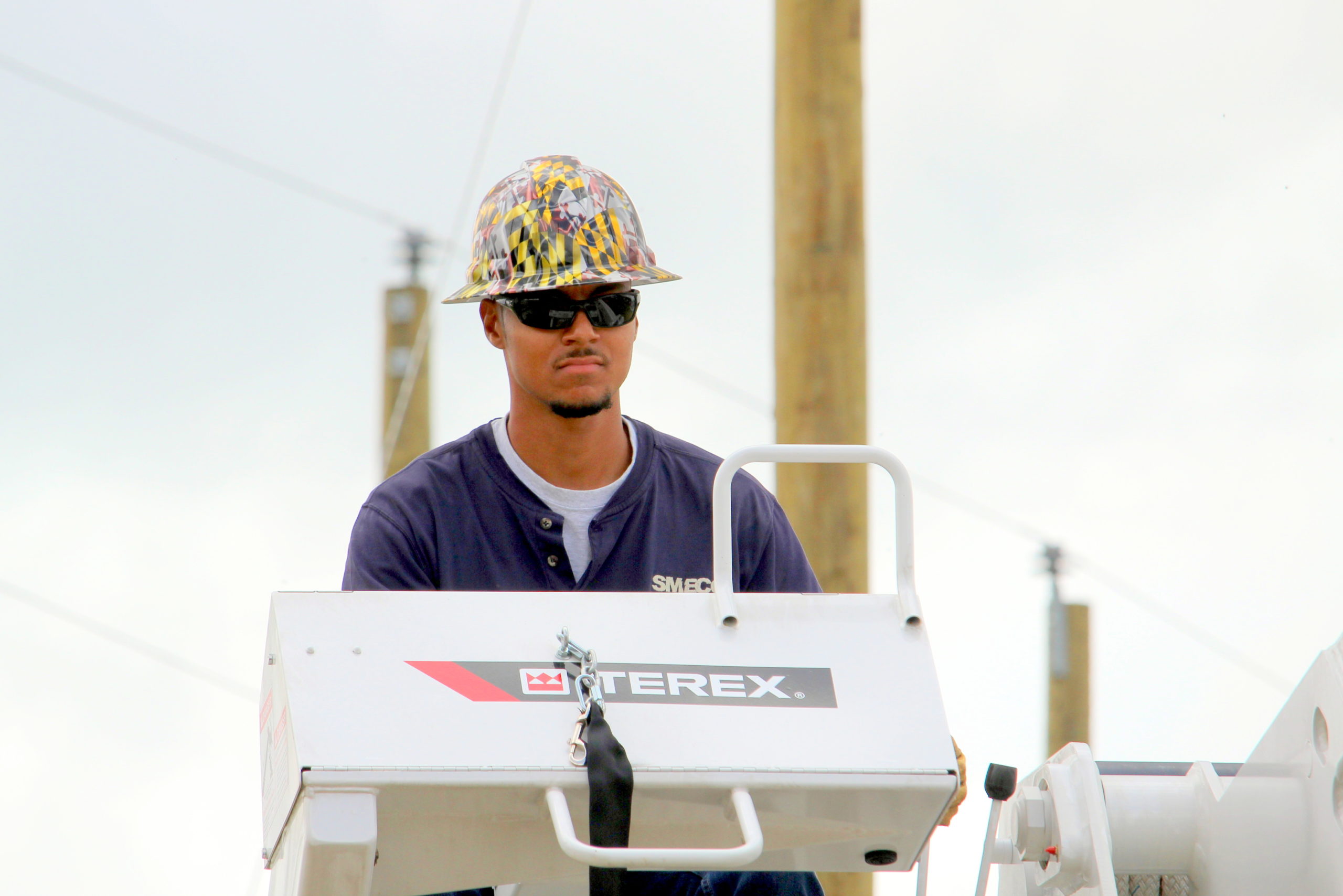 SMECO lineworker competes in the Equipment Operator’s Rodeo competition at the 2022 Gaff-n-Go Lineworker’s Rodeo.