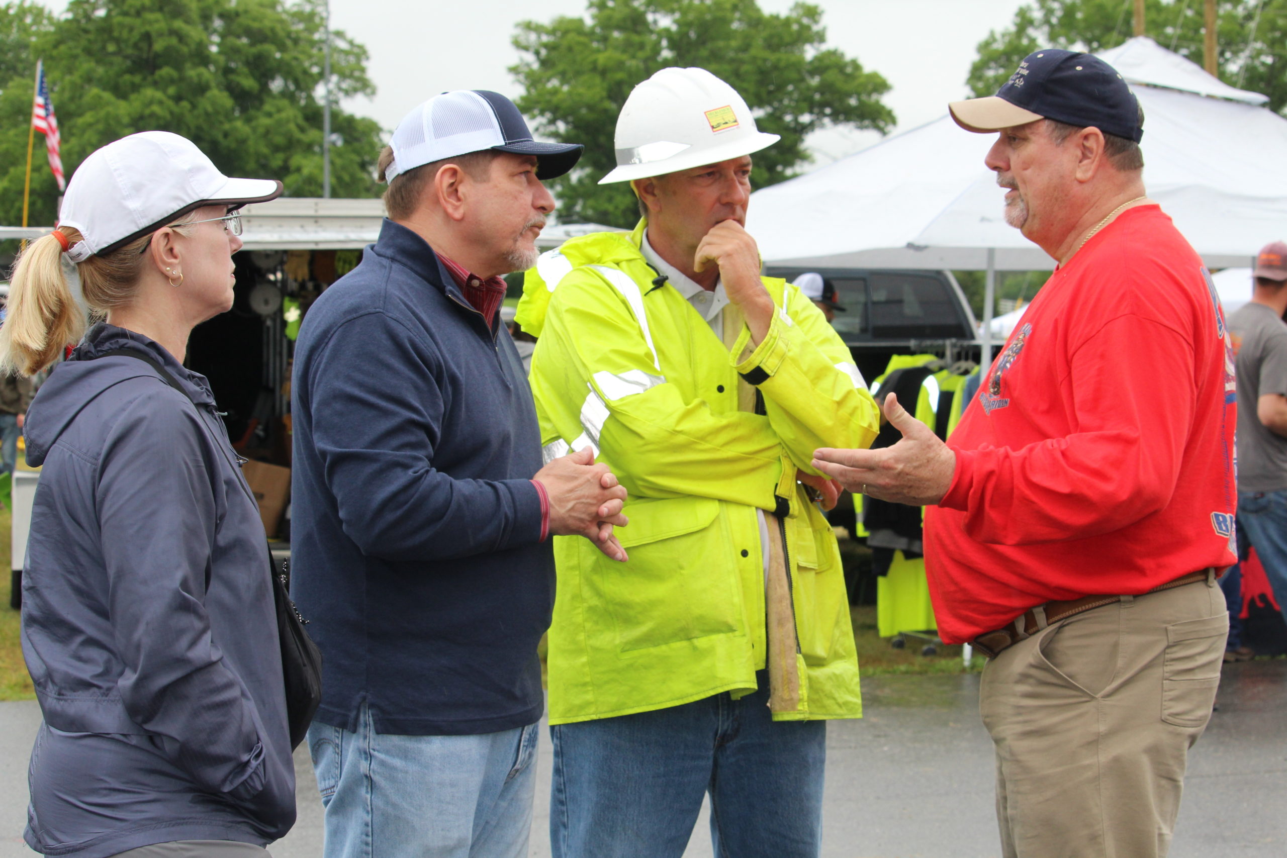 Delegate Reid of Loudoun County visits with John Lee, President & CEO of Mecklenburg Electric Cooperative, at the Gaff-n-Go Lineworker’s Rodeo.